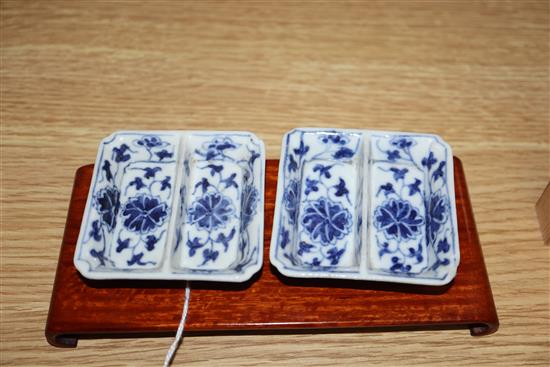 A pair of Chinese blue and white square dishes, Guangxu mark and period, hardwood stand